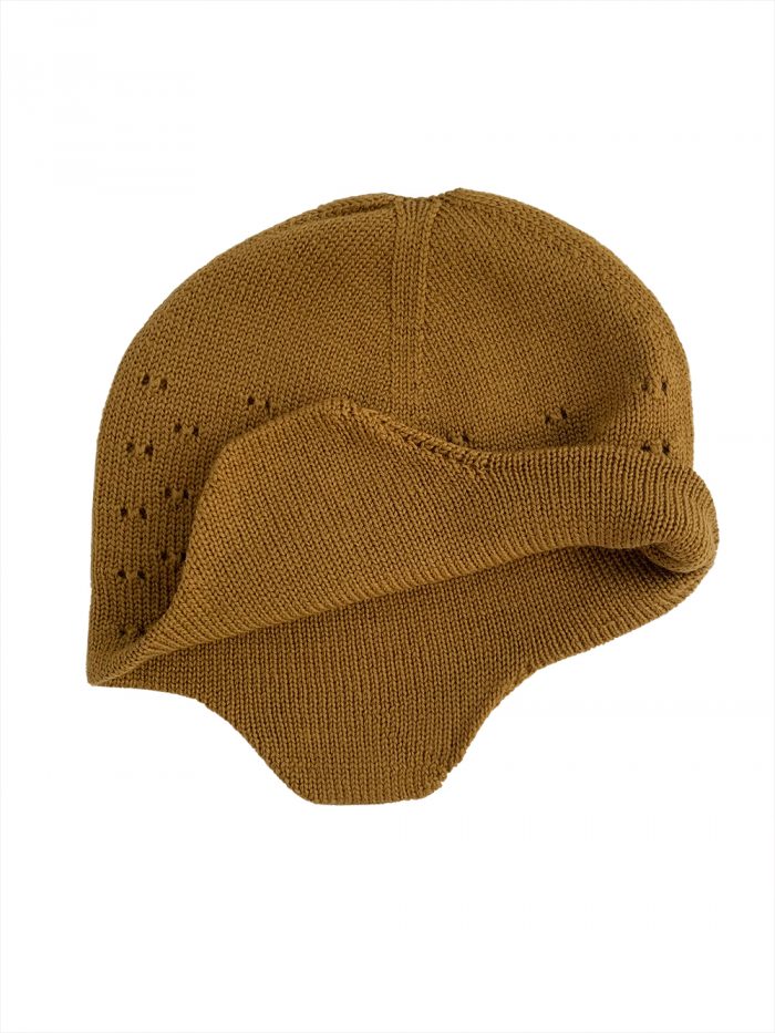 Hvid woolen hat showing the inside and outside design muts dua mustard