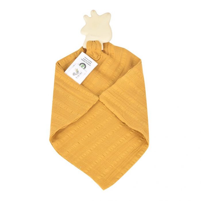 backside of giraffe teether and muslin cloth